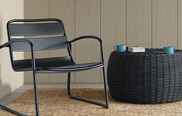 Chair and side table with cups in Hammered Black